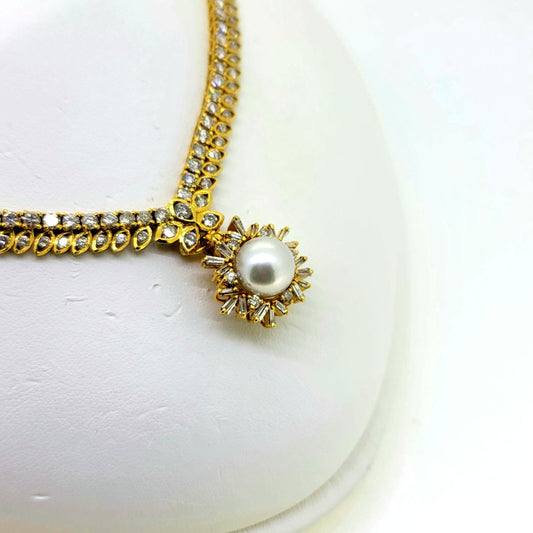 South Sea Pearl and Diamond Pendant Necklace, 10 carat total, 18ct yellow gold necklace set with double row of diamonds with central diamond cluster which suspends the detachable South Sea pearl and baguette-cut diamond cluster pendant drop