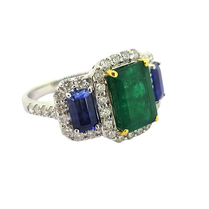 3.28ct Emerald Sapphire and Diamond Triple Cluster Ring, three stone emerald flanked by sapphires within diamond surrounds in 18ct white gold