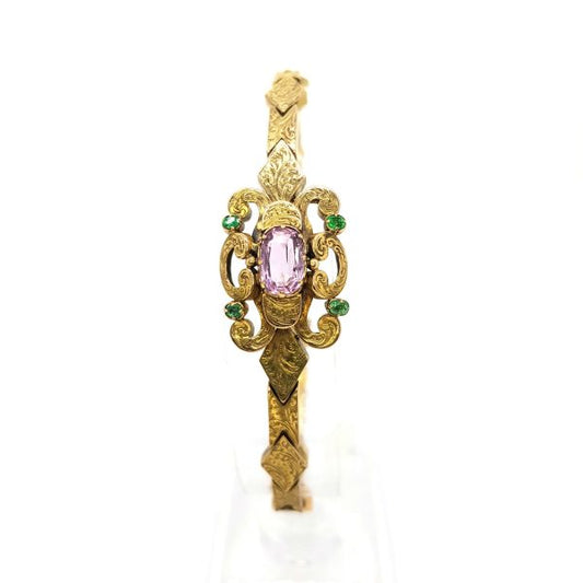 Antique Victorian Pink Topaz and Emerald set 15ct Gold Bracelet; central oval faceted pink topaz is set within scrolled design with a circular cut emerald to each corner