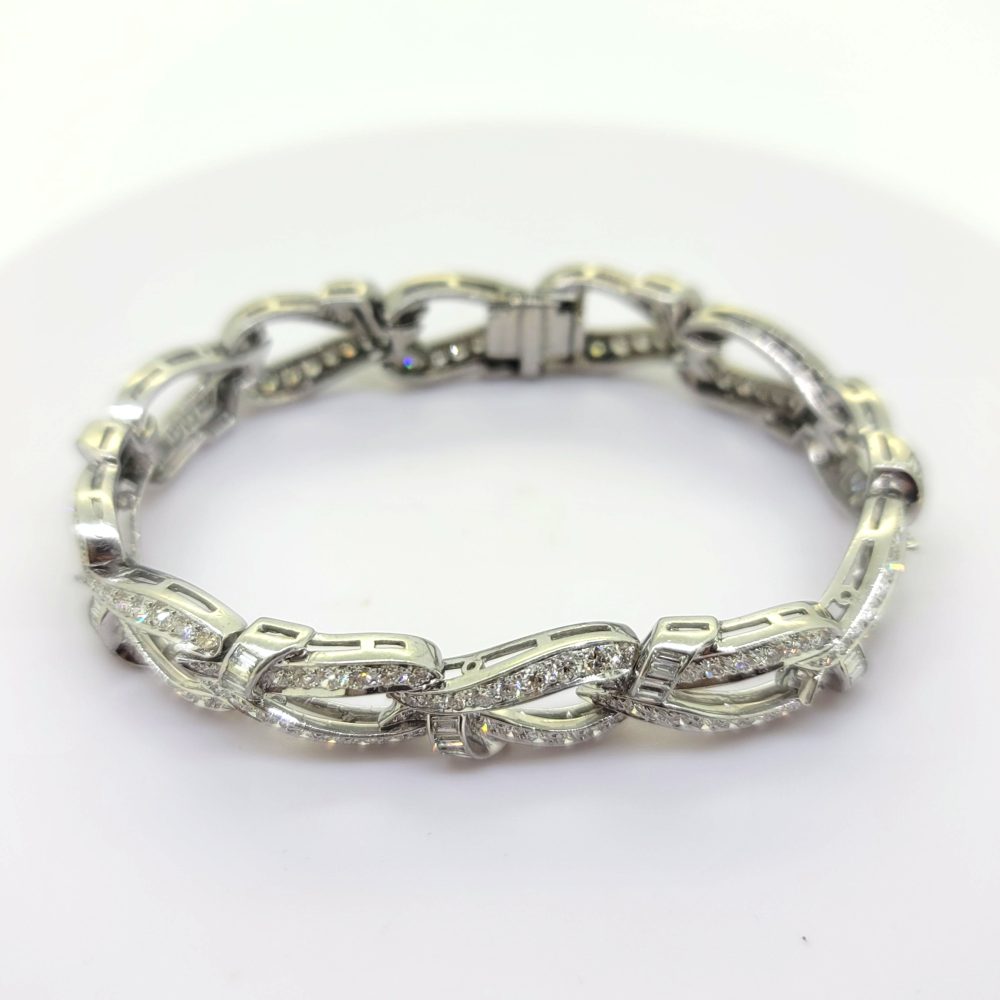 7.20ct Brilliant and Baguette Diamond Set Platinum Link Bracelet, platinum link bracelet set with 7.20 carats of brilliant and baguette cut diamonds with hidden clasp and safety catch