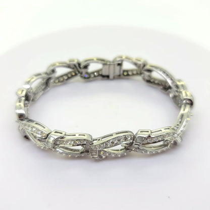 7.20ct Brilliant and Baguette Diamond Set Platinum Link Bracelet, platinum link bracelet set with 7.20 carats of brilliant and baguette cut diamonds with hidden clasp and safety catch