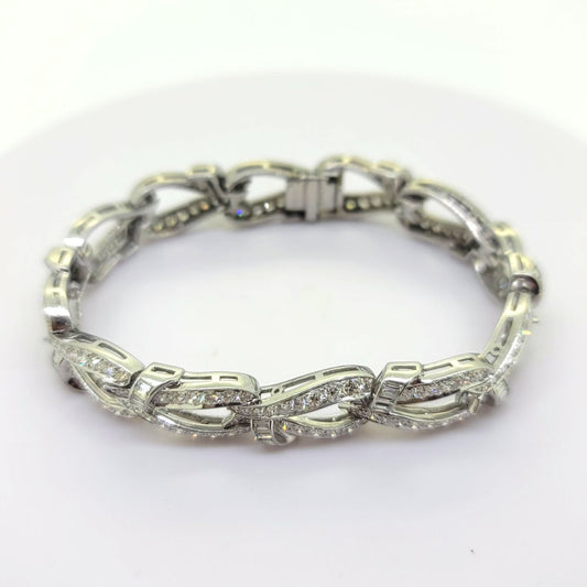 7.20ct Brilliant and Baguette Diamond Set Platinum Link Bracelet, platinum link bracelet set with 7.20 carats of brilliant and baguette cut diamonds with hidden clasp and safety catch