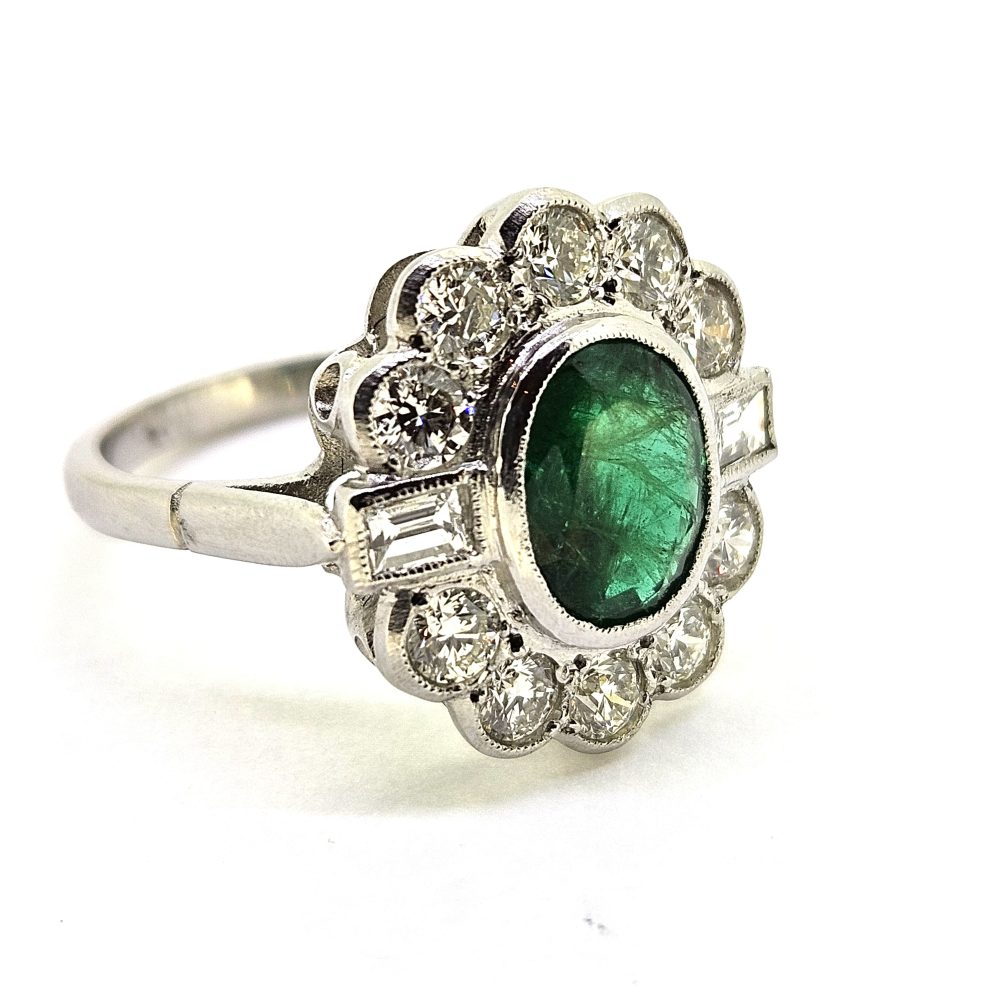 1.50ct Oval Emerald and Diamond Floral Cluster Ring in Platinum