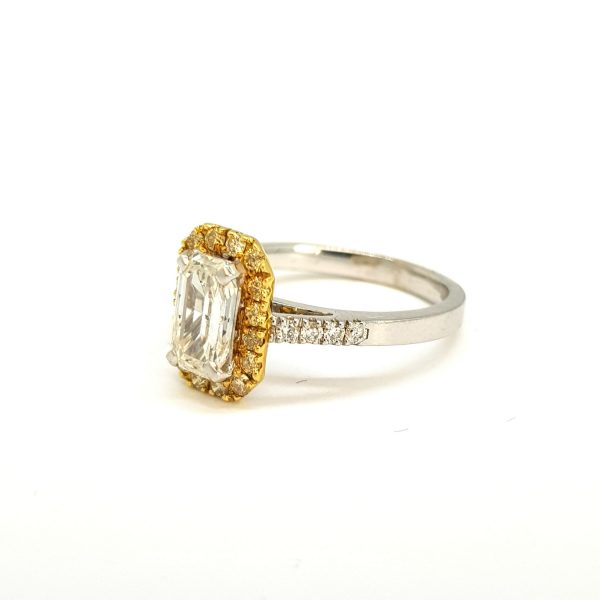 Emerald Cut Diamond Ring with Yellow Diamond Halo