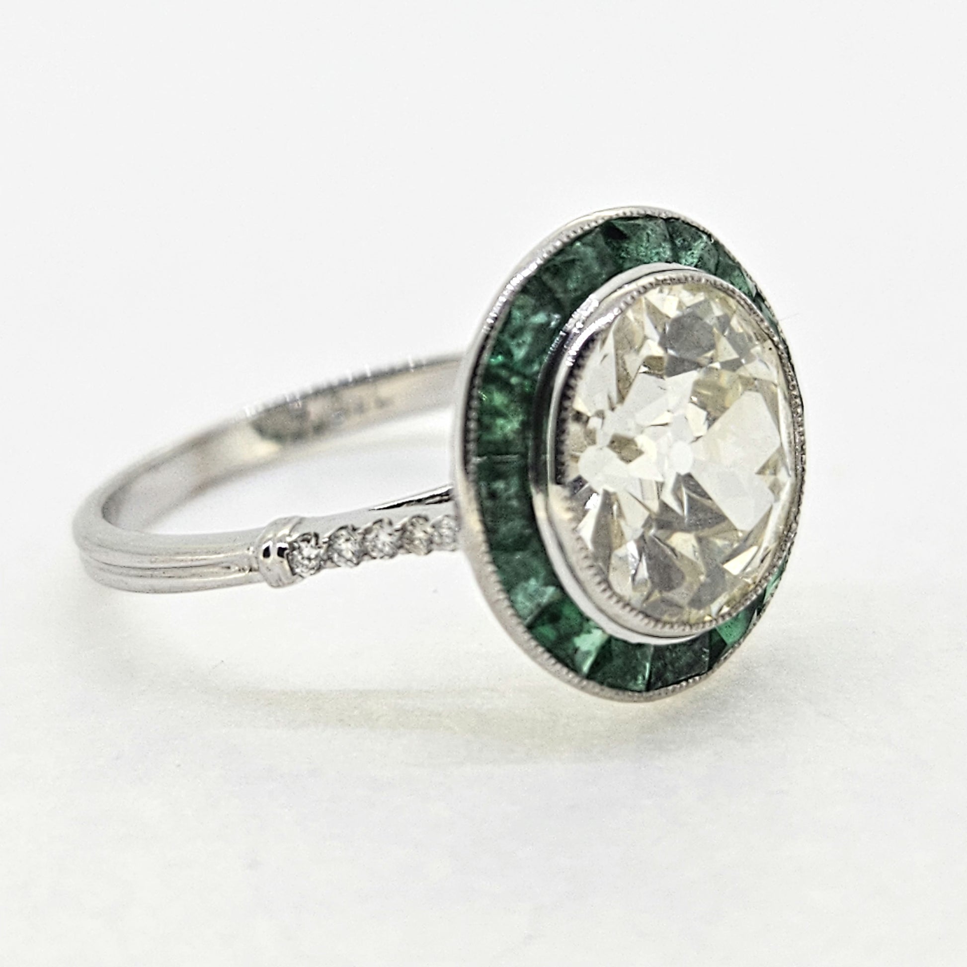 3.30ct Old Cut Diamond and Emerald Halo Cluster Engagement Ring