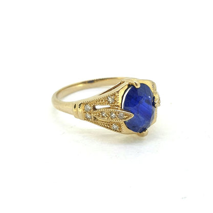 Vintage Oval Blue Sapphire and Diamond Trefoil Shoulders Engagement Ring