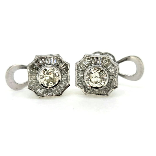 Brilliant and Baguette Cut Diamond Cluster Stud Earrings, 3.82 carat total, central 2.13cts round brilliant-cut diamonds encompassed within 1.69cts tapered baguette-cut diamond surround in 18ct white gold