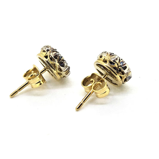 Sapphire and diamond cluster stud earrings in silver and 18ct yellow gold, viewed from behind, on a white background