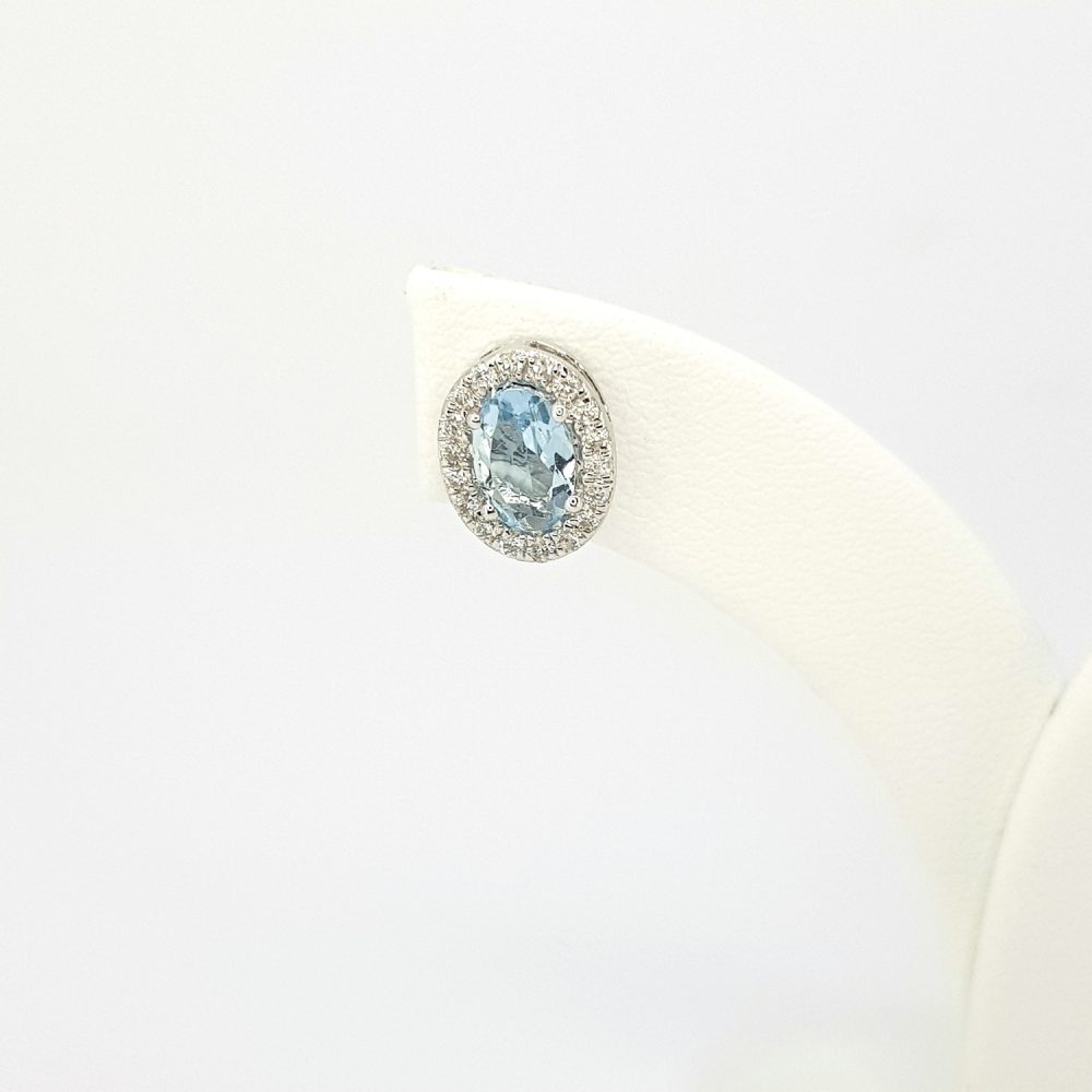 0.63ct Oval Aquamarine and 0.19ct Diamond Cluster Stud Earrings