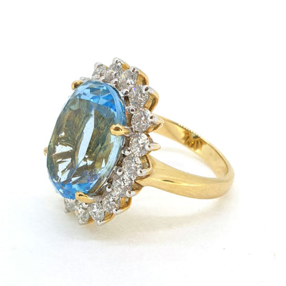 14.28ct Oval Blue Topaz and Diamond Cluster Dress Ring