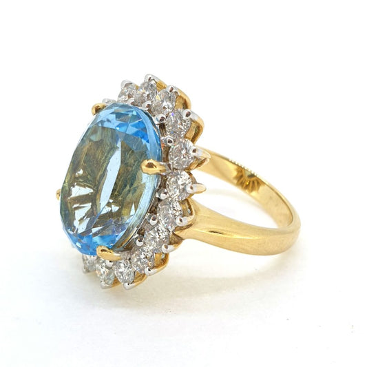 14.28ct Oval Blue Topaz and Diamond Cluster Dress Ring