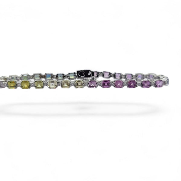 Rainbow Sapphire and Diamond Line Bracelet, 8.27 carats multi fancy colour pink, purple, green, yellow and blue sapphires with diamond accents in 14ct white gold