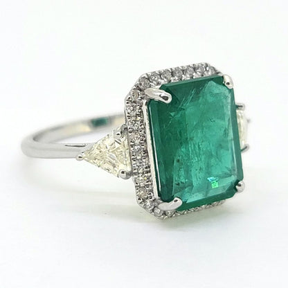 3.85ct Emerald and Diamond Cluster Engagement Ring with Trillion Diamond Sides in 18ct White Gold