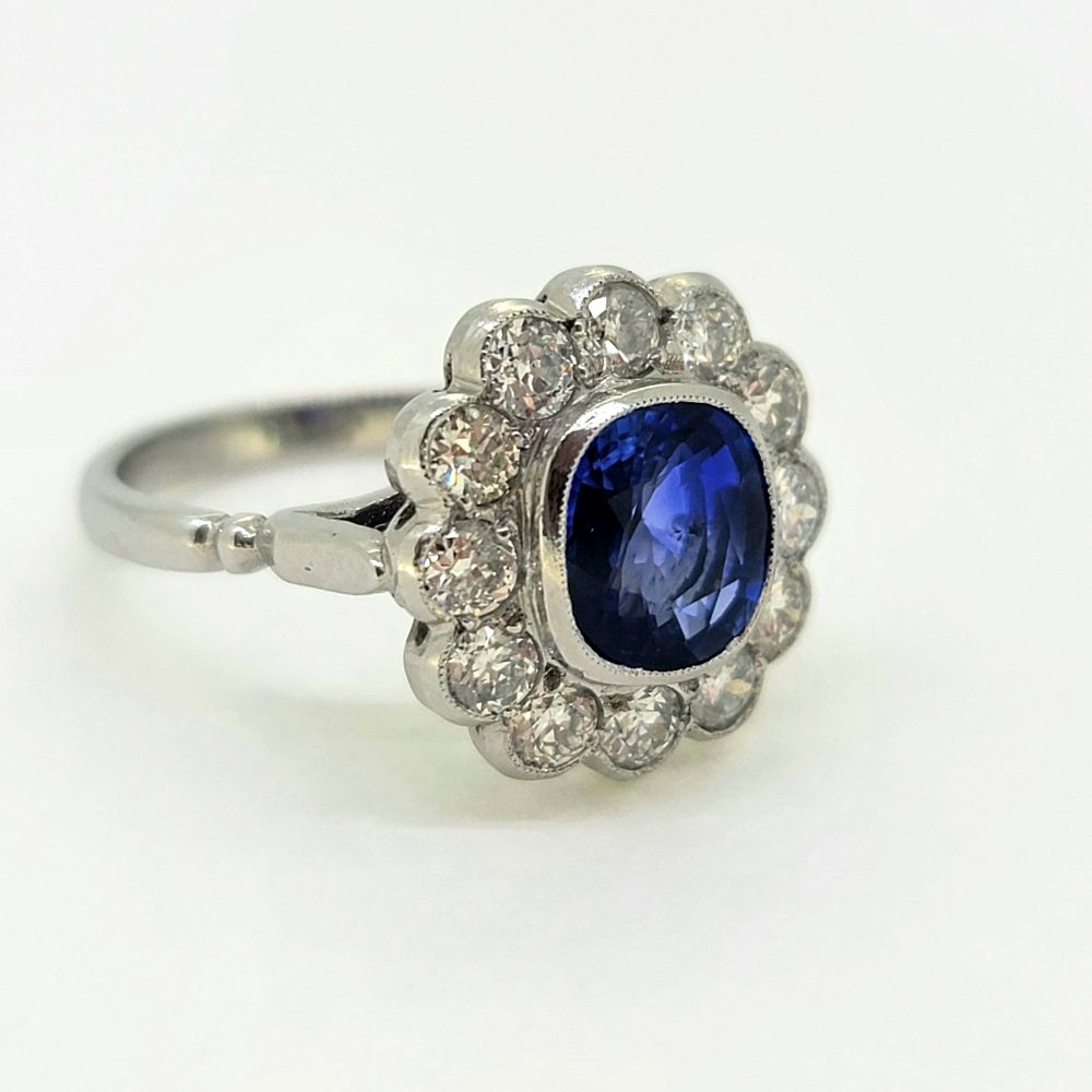 2.25ct Oval Sapphire and Diamond Floral Cluster Ring in Platinum