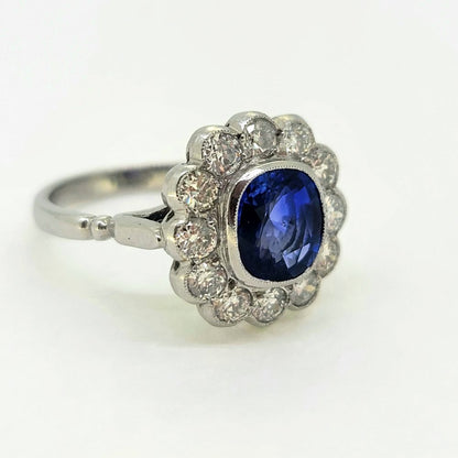 2.25ct Oval Sapphire and Diamond Floral Cluster Ring in Platinum