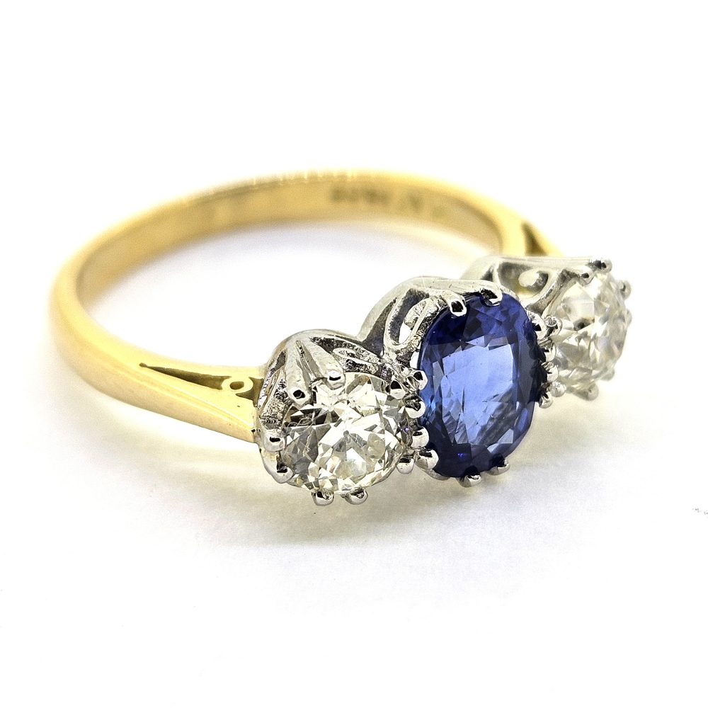 1.20ct Oval Sapphire and Diamond Three Stone Engagement Ring
