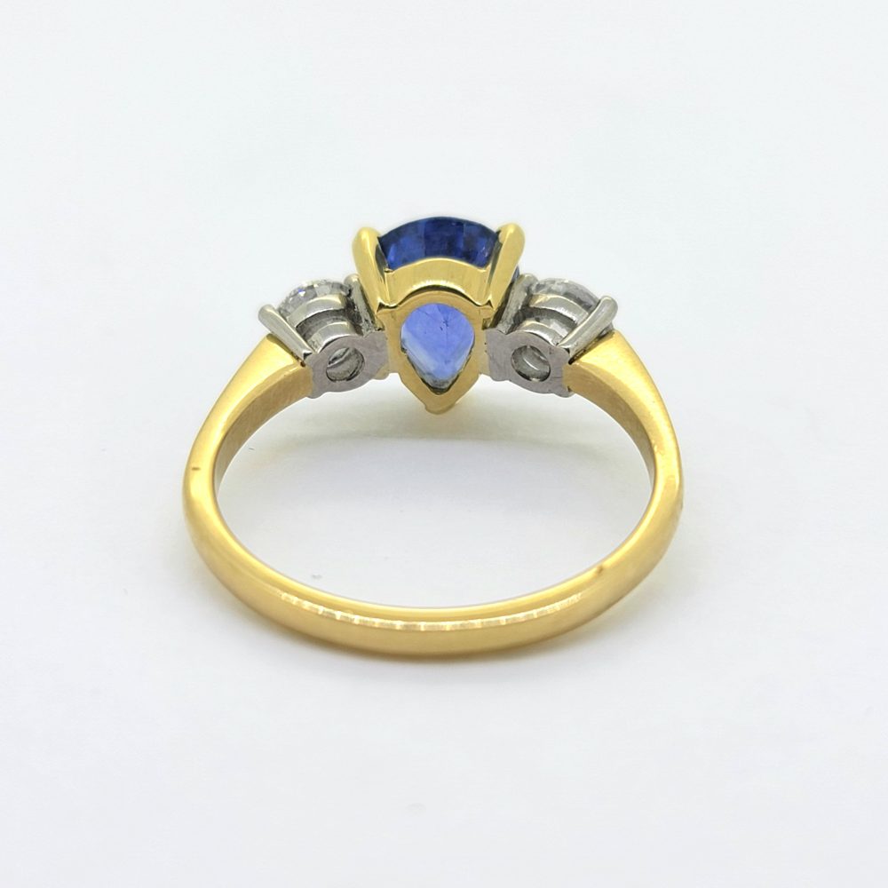 2.2ct Pear Cut Sapphire and Diamond Trilogy Engagement Ring