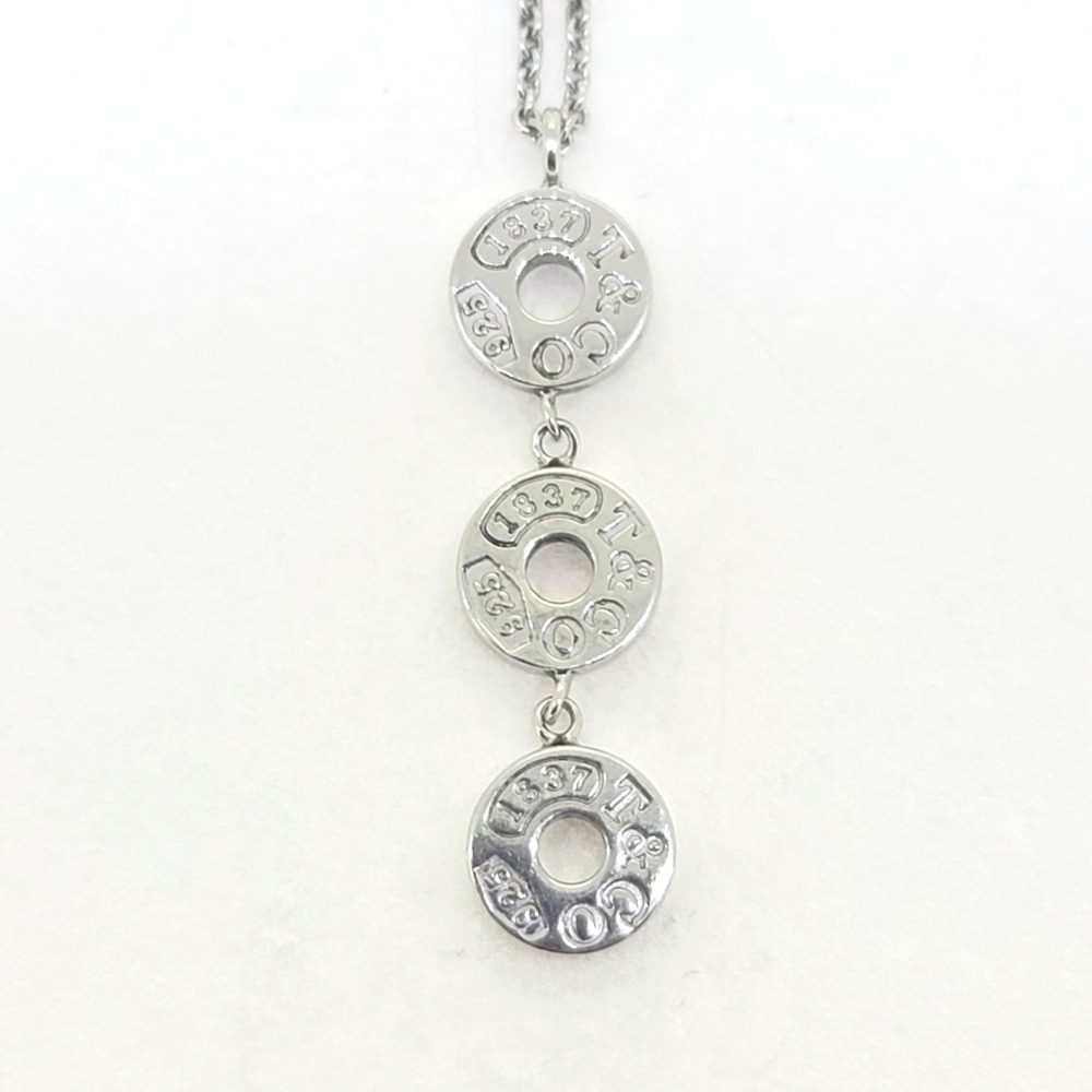 Vintage Tiffany and Co 1837 Collection Circles Drop Pendant, Pre Loved, three 925 silver circles suspended vertically from a fine link chain. Circa 2008