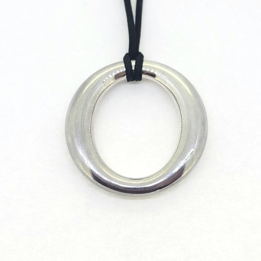 Vintage Tiffany and Co Sevillana Silver Pendant, open circle oval pendant suspended on a black cord 925 silver