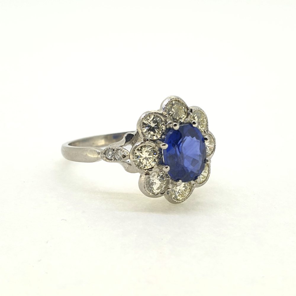 1.90ct Oval Sapphire and Diamond Cluster Engagement Ring in Platinum