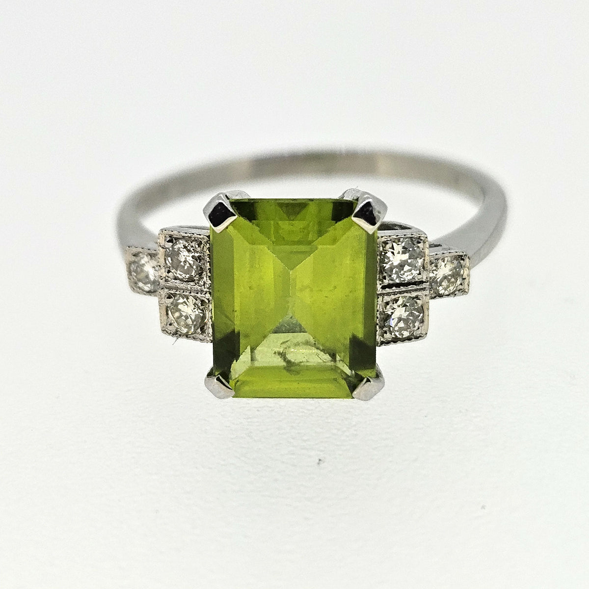 Art Deco Style Platinum Peridot 2.30 Carats and Diamond 0.12 Carat Ring