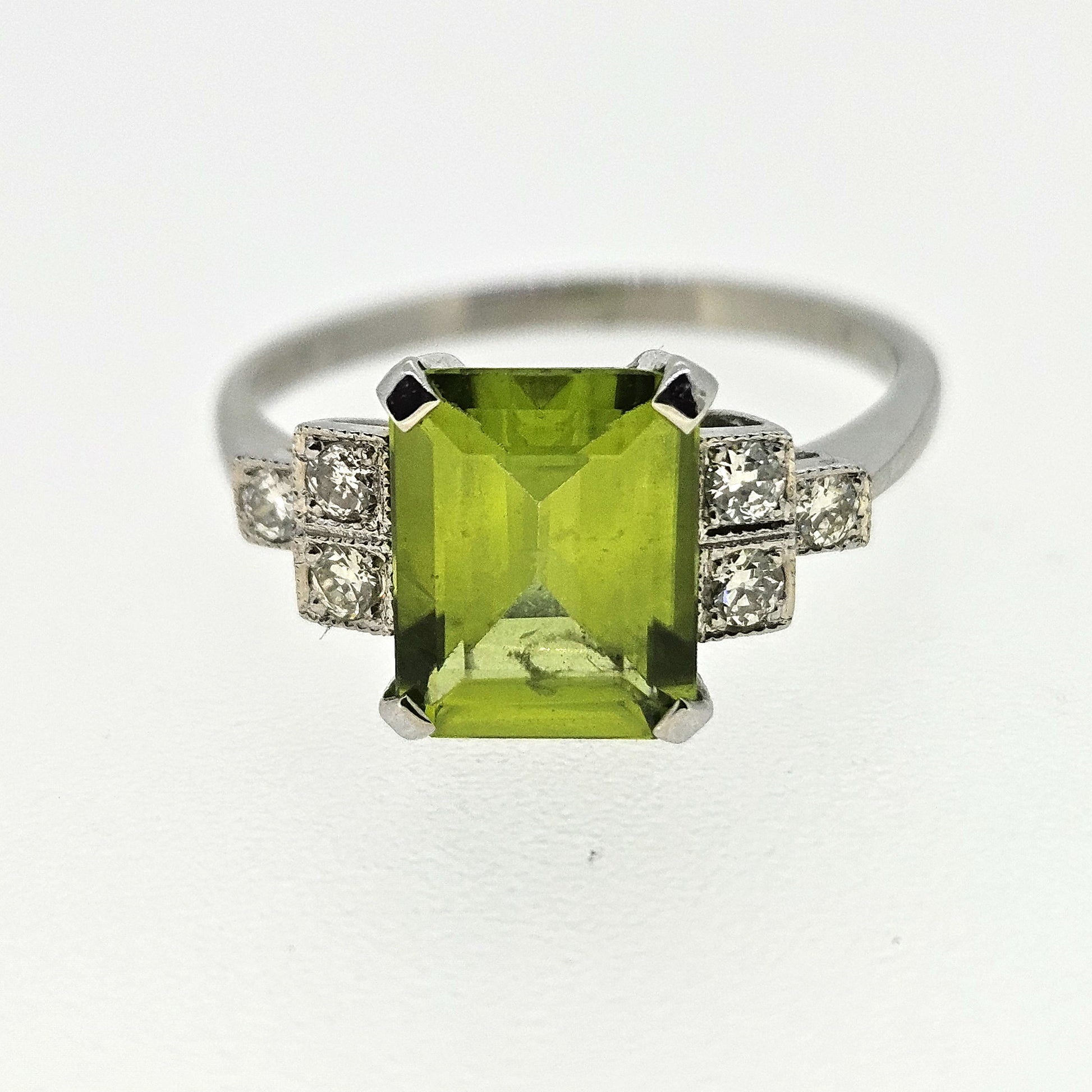 Art Deco Style Platinum Peridot 2.30 Carats and Diamond 0.12 Carat Ring