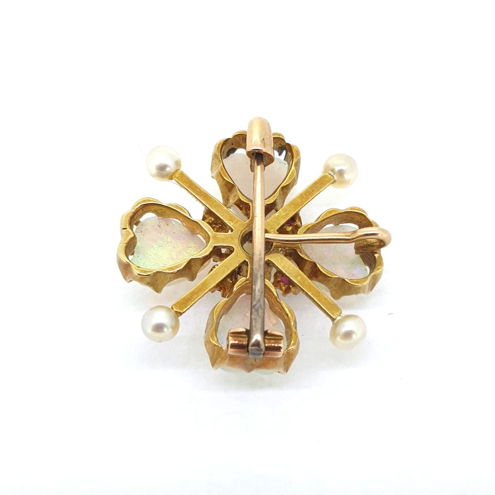 Victorian Antique Heart Cabochon Opal Pearl and Ruby Brooch, four heart-shaped cabochon-cut opals around central opal and ruby cluster accented with pearls in four leaf clover / quatrefoil design