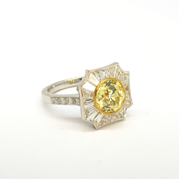 Fancy Yellow Diamond and Tapered Baguette White Diamond Cluster Ring, 2.03 carats