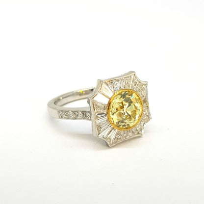 Fancy Yellow Diamond and Tapered Baguette White Diamond Cluster Ring, 2.03 carats