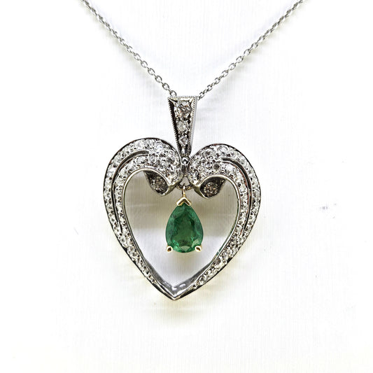 Pear Cut Emerald and Diamond Heart Shaped Pendant in Platinum