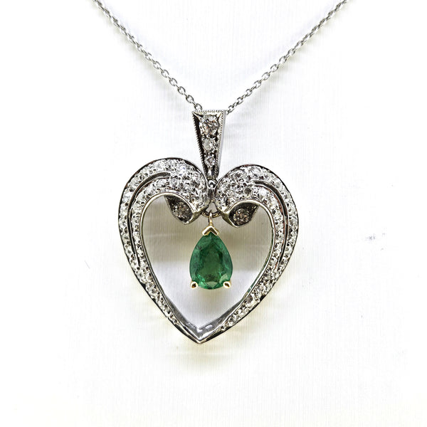 Pear Cut Emerald and Diamond Heart Shaped Pendant in Platinum