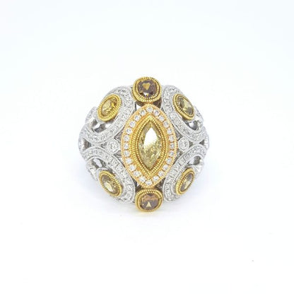 Fancy Yellow Diamond Dress Ring in 18ct White and Yellow Gold; central marquise-cut fancy yellow diamond surrounded by oval-cut and circular-cut fancy yellow diamonds, encompassed by sparkling white diamonds, 2.25 carat total