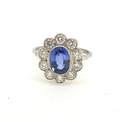 1.85ct Oval Sapphire and Diamond Cluster Engagement Ring in Platinum