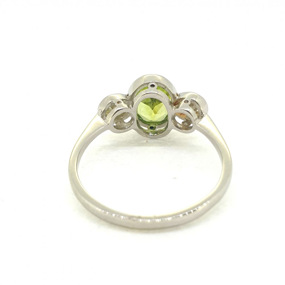 1.25ct Oval Peridot and Diamond Three Stone Ring
