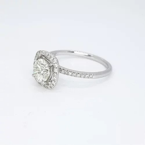 Diamond Halo Cluster Ring, 1.00ct round brilliant-cut diamond surrounded by a halo of diamonds, diamond set shoulders, 1.35 carat total, 18ct white gold