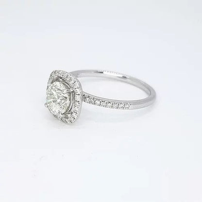 Diamond Halo Cluster Ring, 1.00ct round brilliant-cut diamond surrounded by a halo of diamonds, diamond set shoulders, 1.35 carat total, 18ct white gold