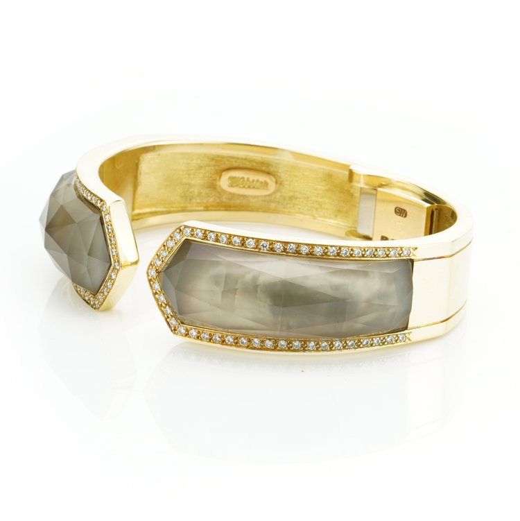 Stephen Webster Bangle Bracelet from Crystal Haze Collection; two faceted quartz crystal sections overlay a layer of Mother of Pearl, surrounded by 0.90cts brilliant cut diamonds, in 18ct yellow gold