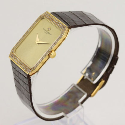 Vacheron Constantin 18ct Yellow Gold Manual Watch with Diamond Bezel; gold colour dial, original diamond bezel and diamond on dial at the centre of the Vacheron Constantin logo, on a Vacheron Constantin dark brown leather strap