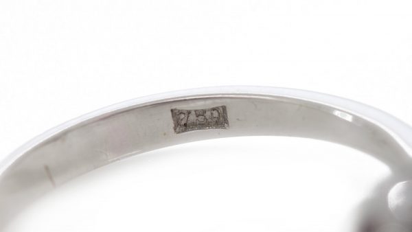 Vintage 1ct Burmese Ruby and Diamond Floral Cluster Ring; set with a natural 1.00 carat octagonal-cut Burmese ruby surrounded by 0.48cts round brilliant-cut diamonds. Circa 1950s-1970s, with Certificate