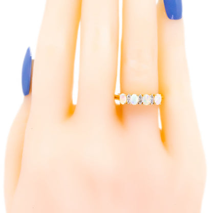 Diamond and Opal Four Stone Eternity Ring in Yellow gold
