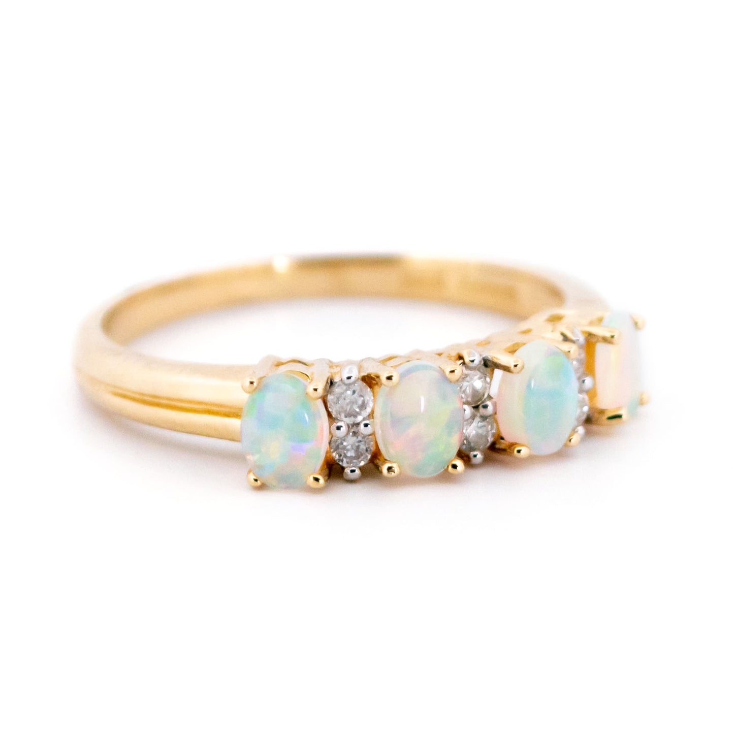 Diamond and Opal Four Stone Eternity Ring in Yellow gold