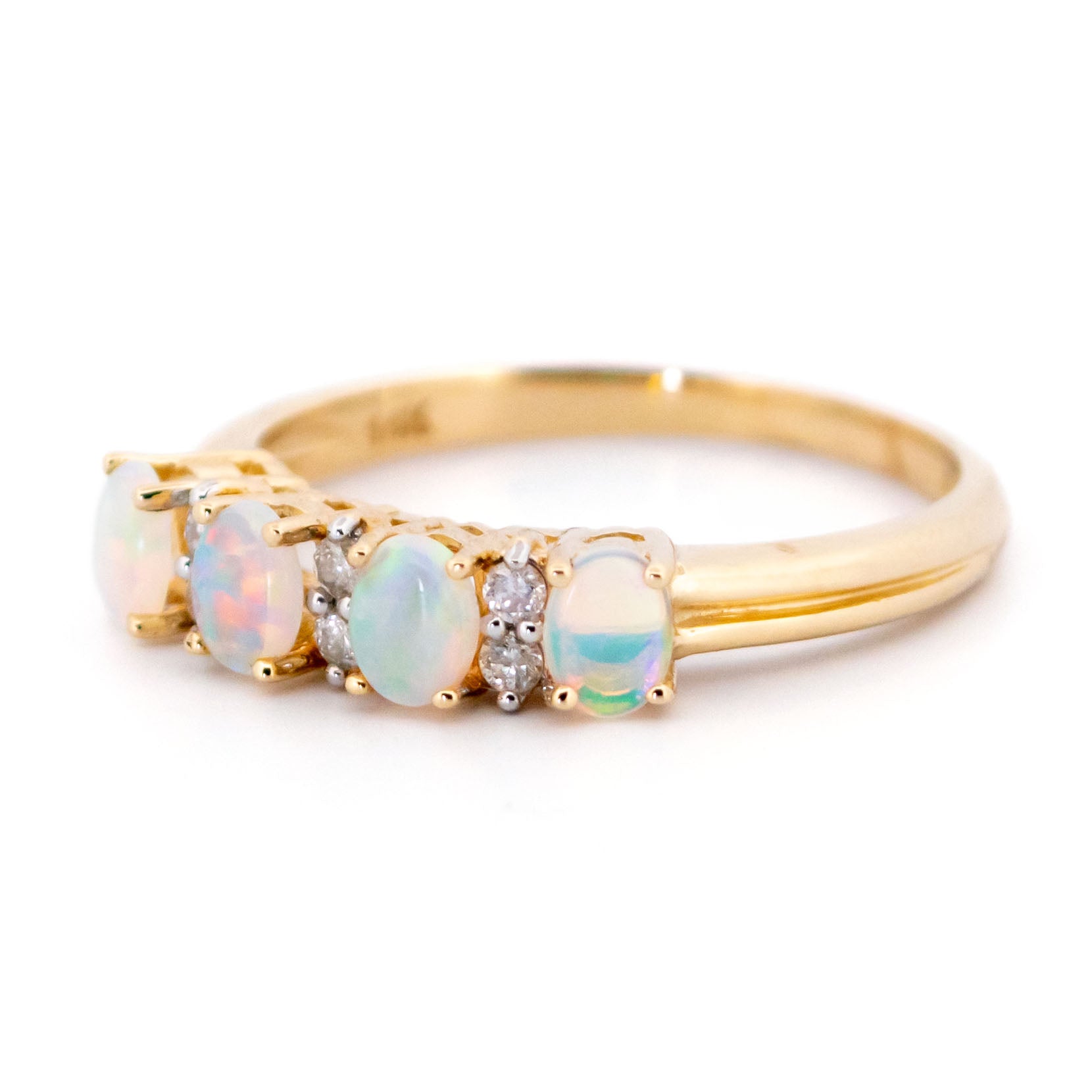 Diamond and Opal Four Stone Eternity Ring in Yellow gold