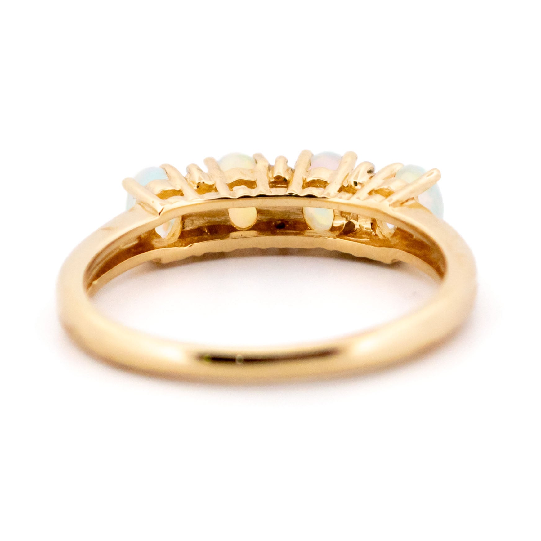 Diamond and Opal Four Stone Eternity Ring in Yellow gold