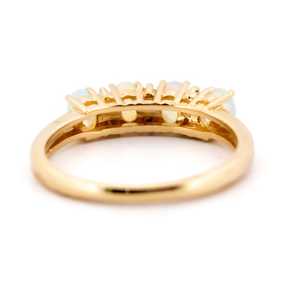 Diamond and Opal Four Stone Eternity Ring in Yellow gold