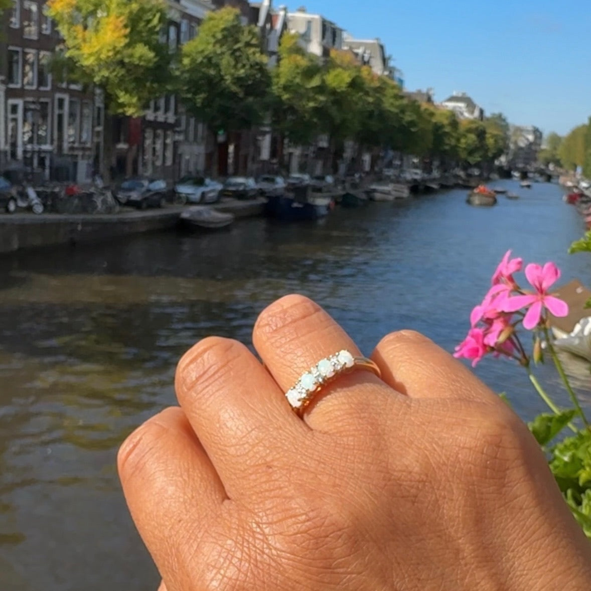 Diamond and Opal Four Stone Eternity Ring in Yellow gold