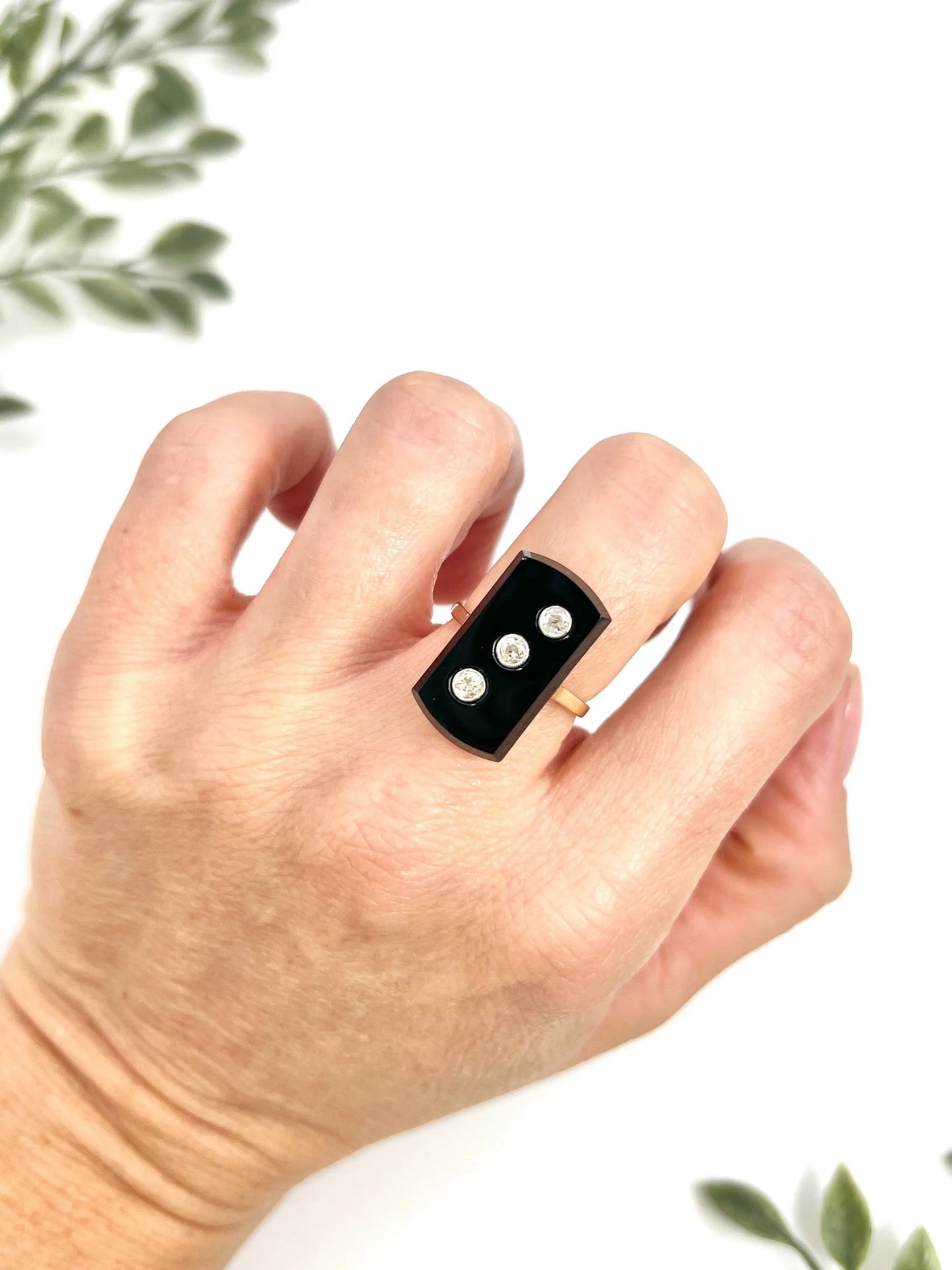 Art Deco 18 Carat Gold Rectangular Onyx and Diamond Three Stone Ring, Circa 1920