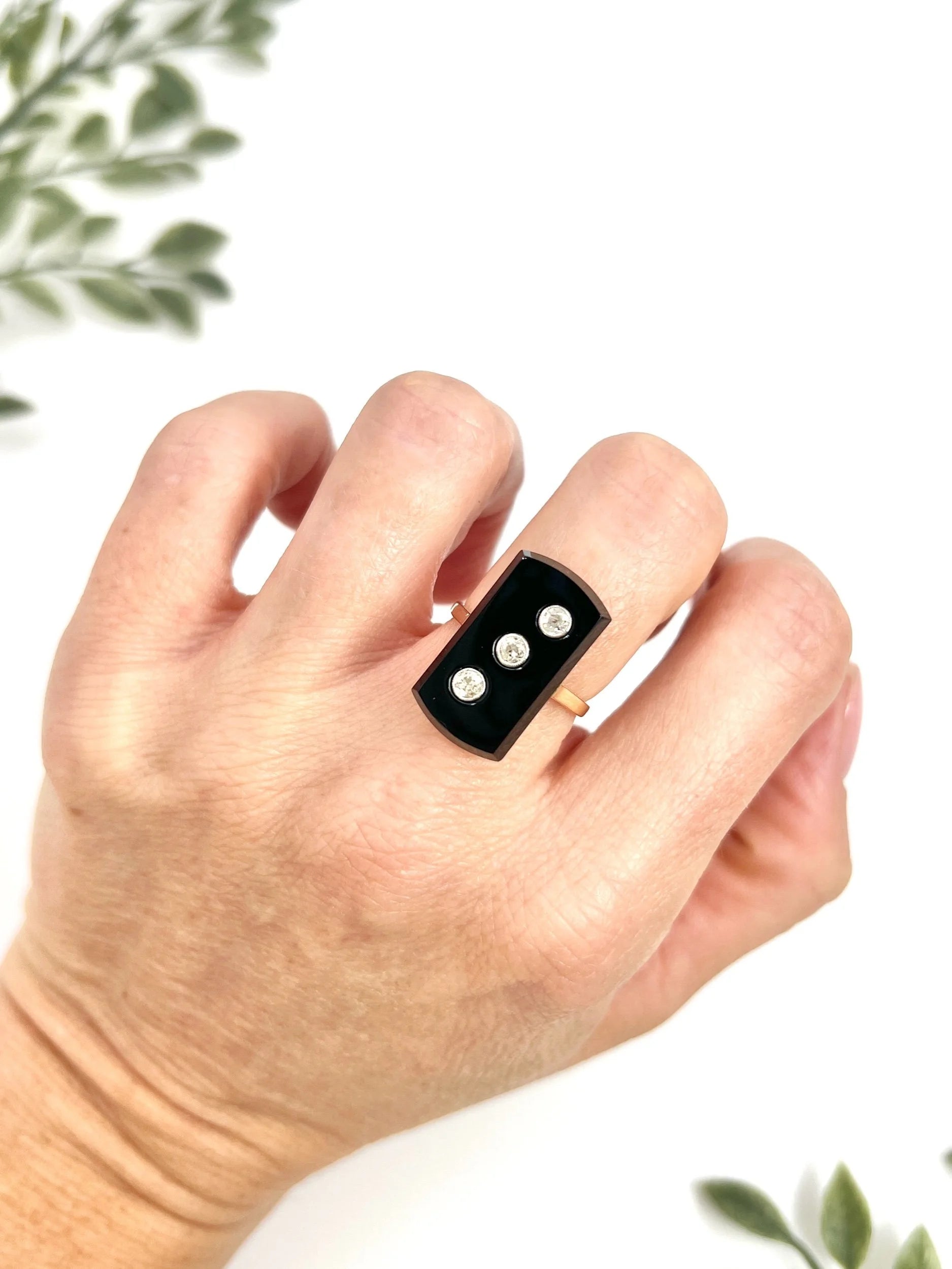 Art Deco 18 Carat Gold Rectangular Onyx and Diamond Three Stone Ring, Circa 1920