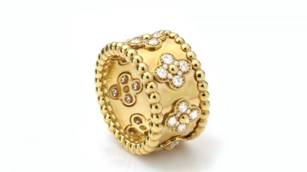 Vintage Van Cleef and Arpels Perlee Clover Floral Diamond Band Ring; crafted from 18ct yellow gold and set with 1.40 carats round brilliant-cut diamonds in a floral design. Circa 1990s