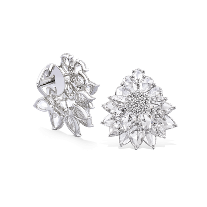 Rose Cut Diamond Floral Cluster Stud Earrings; set with pear shaped rose-cut diamonds and round brilliant cut diamonds, 8.21 carat total, F/G colour VS clarity