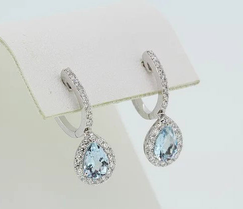Aquamarine and Diamond Pear Shaped Cluster Drop Earrings; 1.27cts pear aquamarines surrounded by diamonds, diamond set hoop, 18ct white gold.